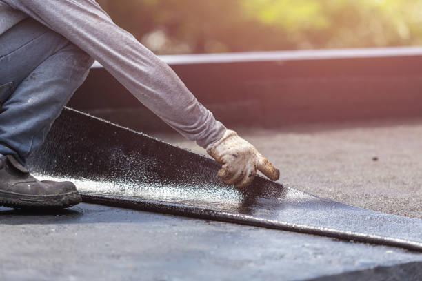 Professional Basement Waterproofing technician working in Madison, IN
